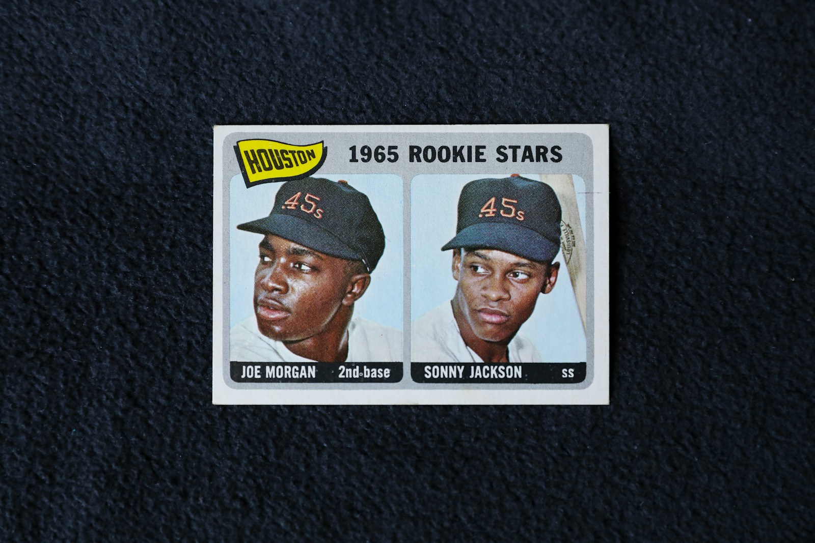 Baseball card value lookup photo showing real baseball cards on a table